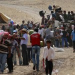 Le foto dei 34mila profughi siriani che hanno attraversato il confine appena aperto tra Siria e Kurdistan iracheno